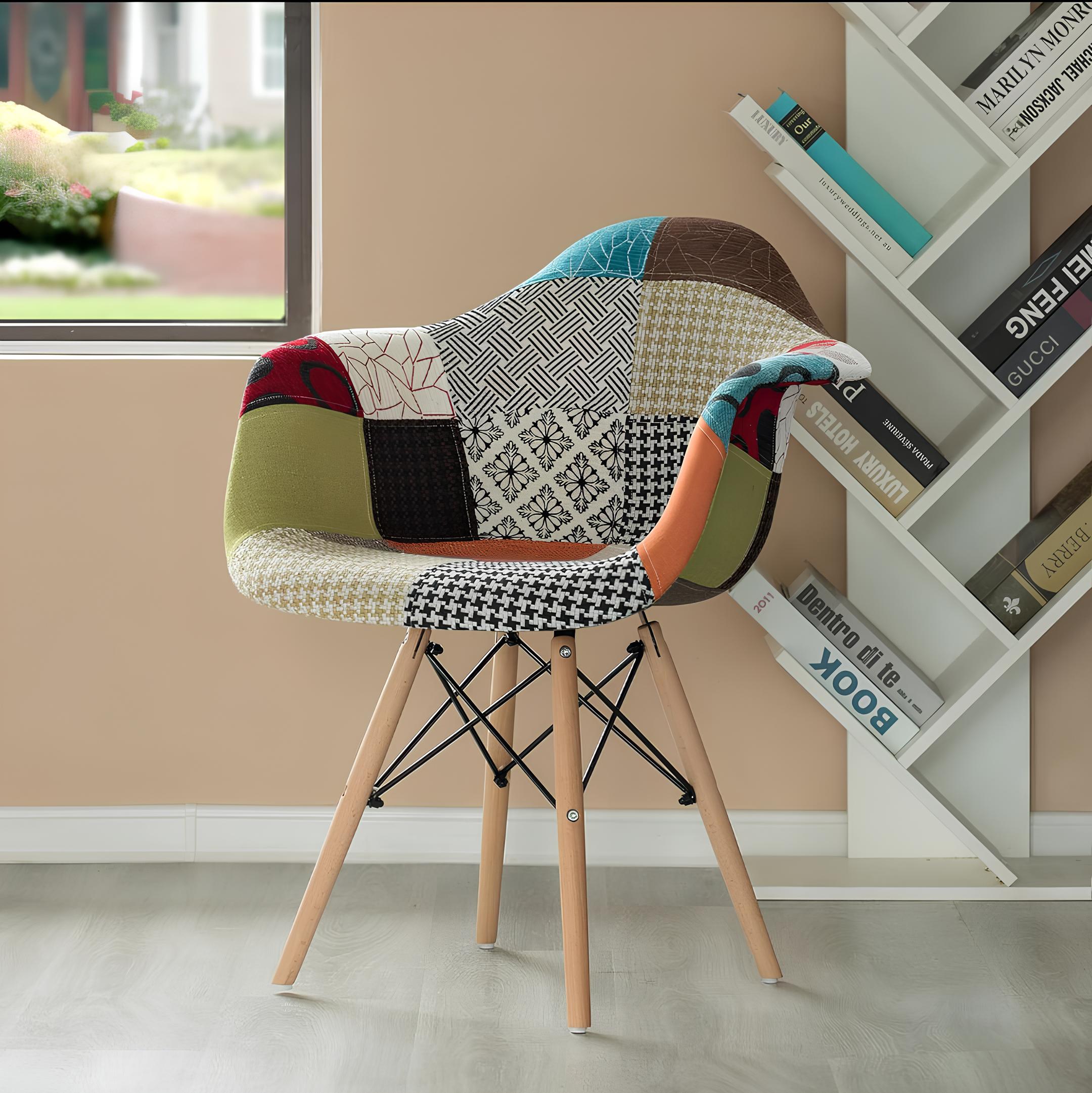 Patchwork fabric lounge chair with wooden legs in a modern interior