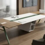 Modern executive conference table with cable management in corporate boardroom